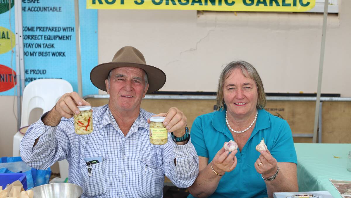 GARLIC GROWTH: “This is my third year exhibiting and it’s by far and consistently the best sales I have had." Roy Cody and wife, Marilyn, at last year’s Moree on a Plate. 