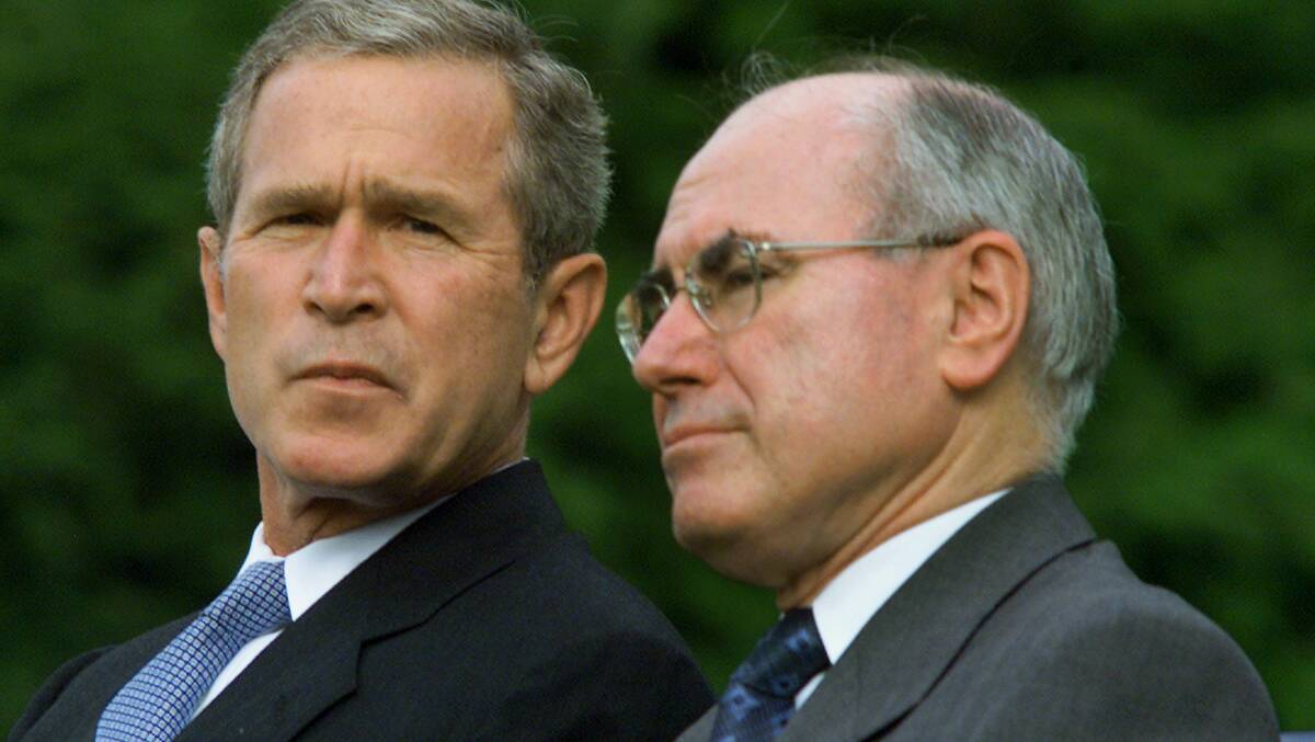 Then US President George W. Bush, left, with then prime minister John Howard on September10, 2001 in Washington DC. Picture: Getty Images