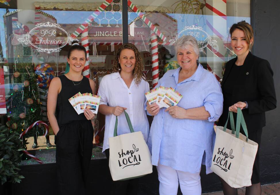 PR Interiors' Dimitee Spriggs and Shallen Fuller with Moree mayor Katrina Humphries and MPSCs acting economic development and grants manager Susannah Pearse encourage people to buy the Love Local gift cards and support local businesses.