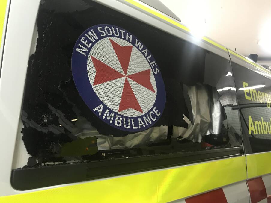ROCK DAMAGE: The back windows of the ambulance were completely destroyed during the attack on Monday night. Photo: Kelly Girard