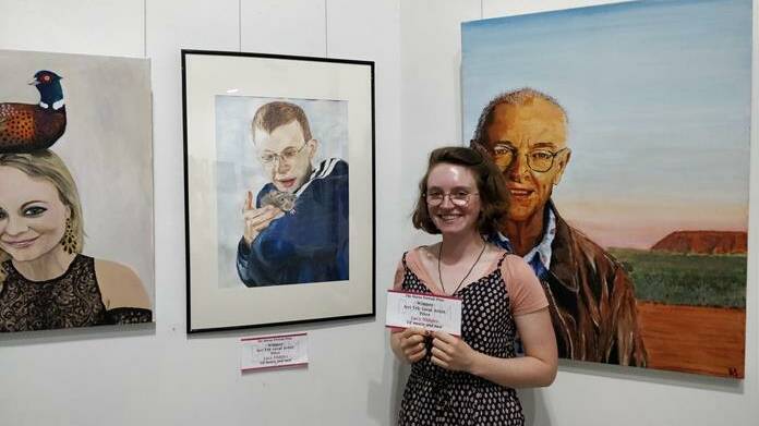 Local 2018 prize winner Lucy Midgley at last year's Moree Portrait Prize exhibition opening.