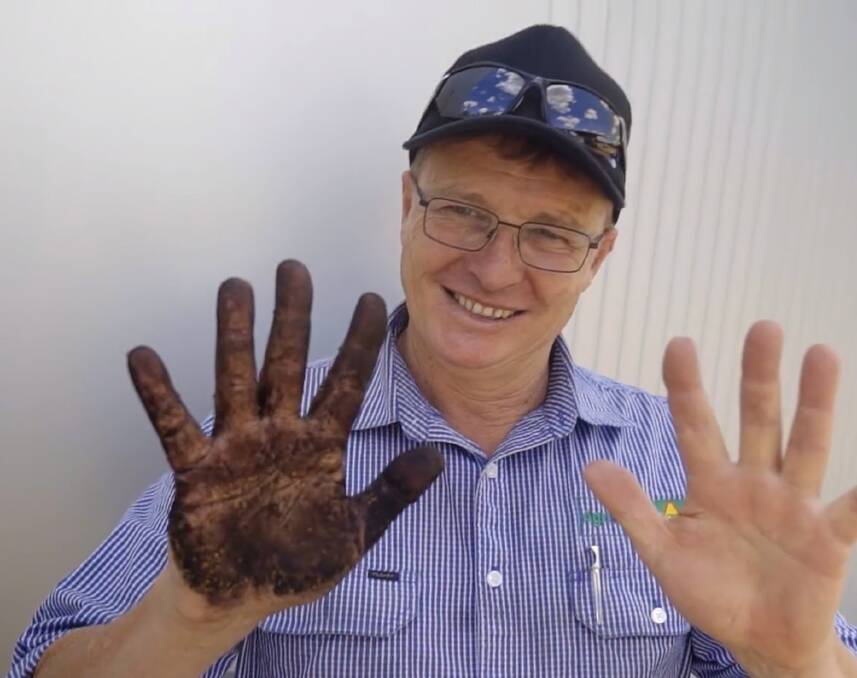 SoilCQuest 2031 managing director Guy Webb gets his hands dirty for World Soils Day. Photo: contributed