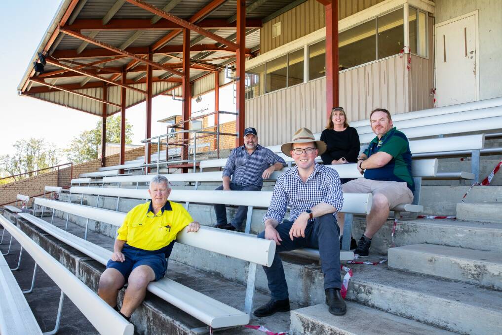 Moree Race Club president Rob Mather, committee member Michael Davison, Northern Tablelands MP Adam Marshall, NSW Crown Lands senior property management officer Michelle Chittendon and Race Club vice president Jason Auld in the old grandstand.
