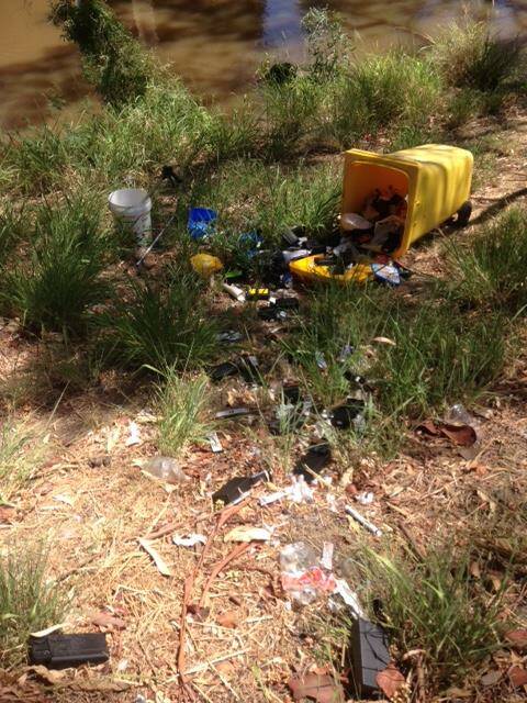 The mess vandals caused after scattering needles along the banks of the Mehi River.