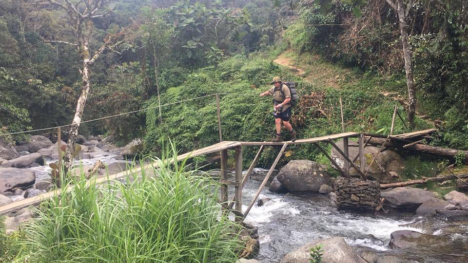 OPPORTUNITY OF A LIFETIME: Bailey Simmons crosses a creek along the Kokoda Track.