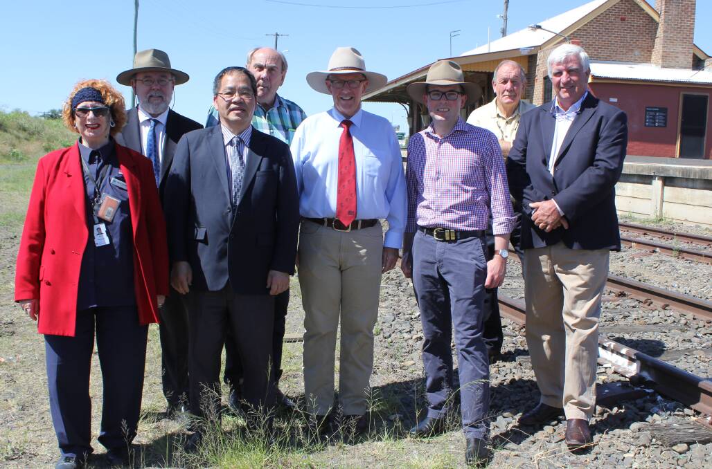 WIN FOR MOREE: Federal Member for Parkes Mark Coulton (fourth from right) and Northern Tablelands MP Adam Marshall (third from right) with Moree Plains Shire councillors Kerry Cassells, director of planning and community development Angus Witherby, George Chiu, Jim Crawford, Stephen Ritchie and Mike Montgomery.
