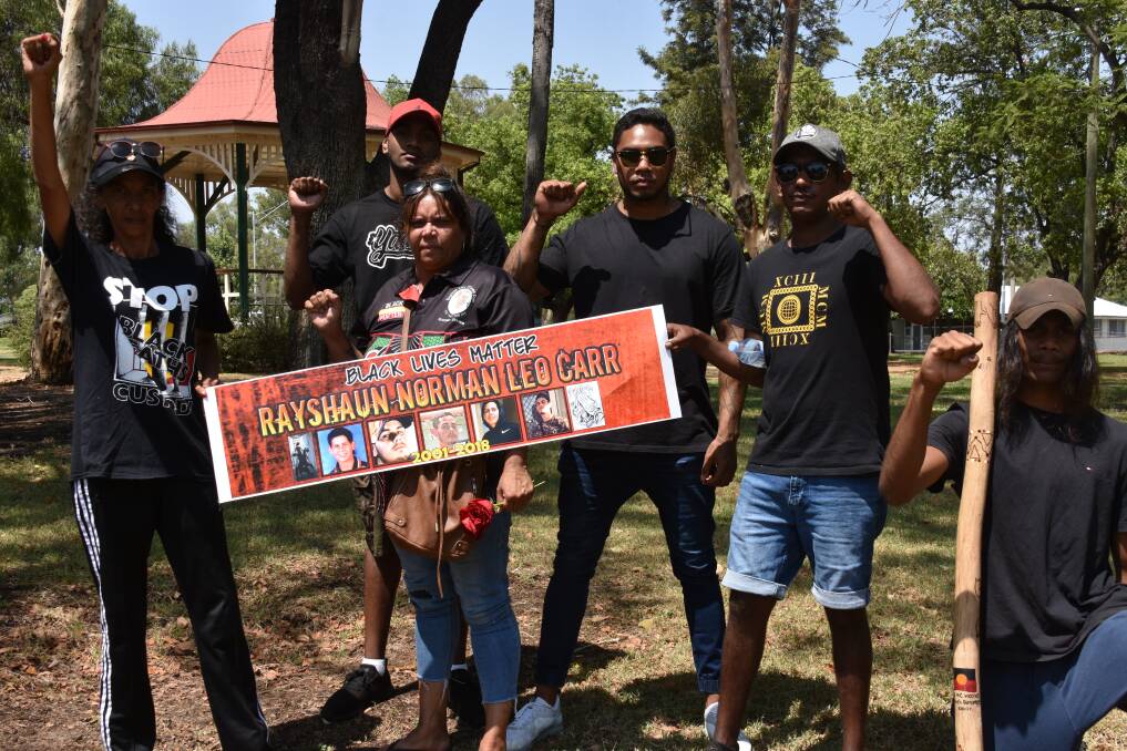 Gwenda Stanley, Grant Aloiai, Christina Carr, MC Mooks, Paul Spearim and Lionel Lacey pictured at a march and protest in Moree in February.