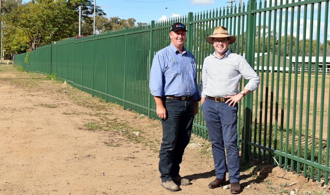 Moree Show Society president Brendan Munn and Northern Tablelands MP Adam Marshall inspecting the new showground perimeter fence.