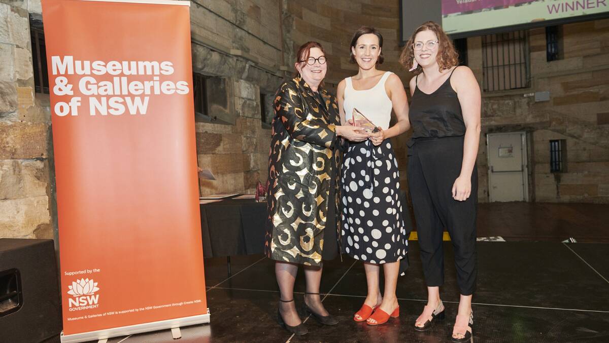BAMM director Vivien Clyne and former curator Hannah Williamson accept the award.