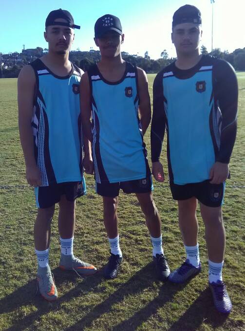 Twins Daniel (left) and Dwayne (right) Smith and their cousin Adrian Smith (centre) all represented Moree in the North West open boys touch football team in Bateau Bay this week.