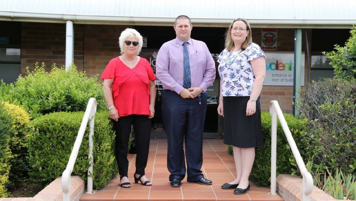 CUC North West chair Cathy Redding and board member Mitchell Johnson hand over the keys to the Moree campus to newly-appointed North West manager Cathy Walters.