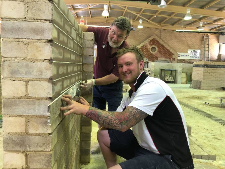 Bricklaying student Josh Mumberson with TAFE NSW Teacher Peter Moore.