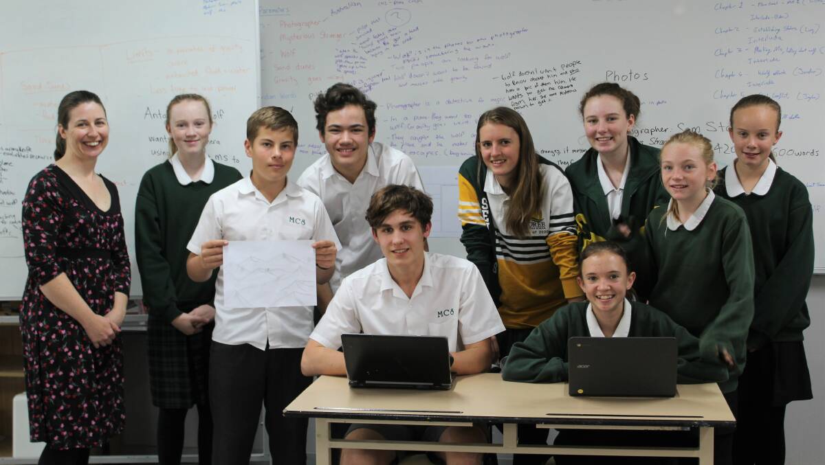 CREATIVITY FLOWING: Teacher Lesley Barklay with the students who put their hand up to write a book in a day - (back) Lucy Beness, Matthew McLane, Joshua Henley, Talitha Mitchell, Michelle Dunlop, Jaylee Auld, Alison Baird, (front) Jordan Briggs and Eden Mitchell. Photo: Natalija Stanojevic