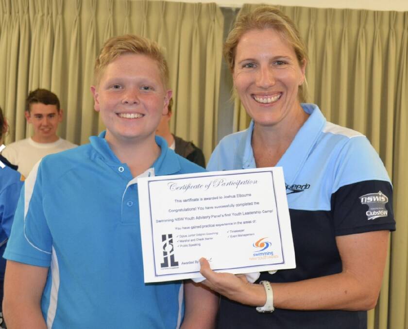 Josh Elbourne was presented a certificate for participating in the Lane Ropes to Leadership Camp by Swimming NSW sport development and participation manager Sarah Koen.