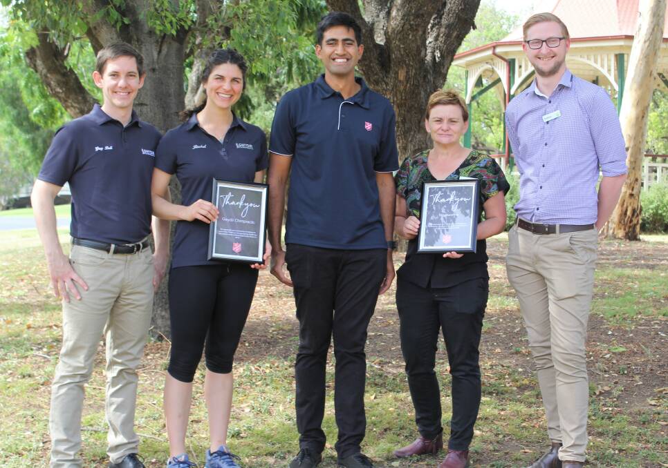 GRATEFUL: Moree Salvation Army program manager Jason Poutawa (centre) presented Gwydir Chiropractic and Physiotherapy's Greg and Rachel Bell and Woolworths Moree assistant store manager Kylie Heffernan and manager Andrew Finch with certificates of appreciation for their significant sponsorship throughout the year.