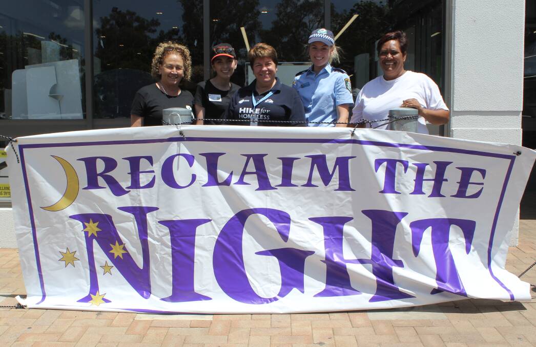 RAISING AWARENESS: Moree's NoVA committee members Carol French, Sarah Coomb from Hunter New England Health, Sandra Roberts from Byamee, domestic violence liaison officer Jenna Aslin and Lorilie Haines manned the barbecue for Reclaim the Night recently.