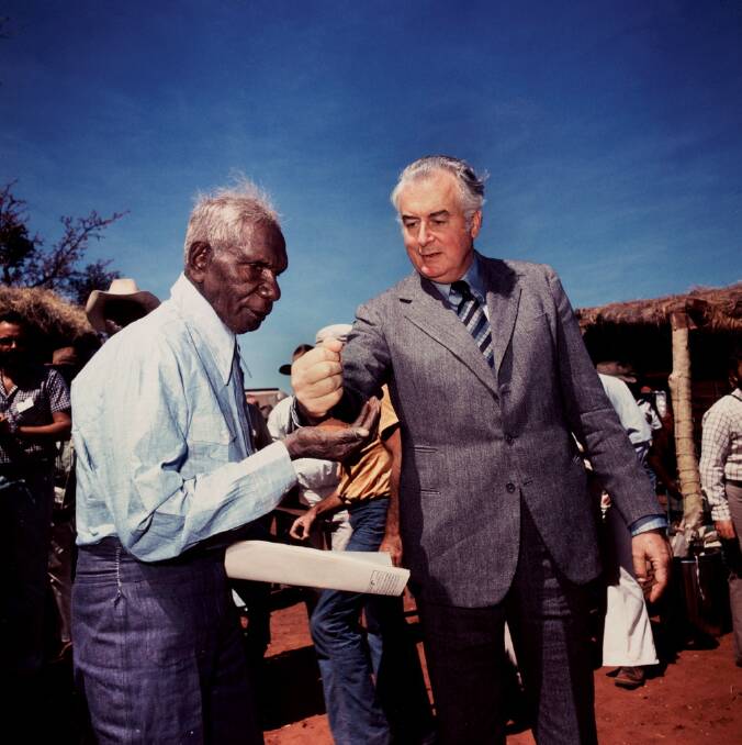 One of Mervyn Bishop's most iconic photographs - Prime Minister Gough Whitlam pours soil into the hands of traditional land owner Vincent Lingiari, Northern Territory 1975 type R3 photograph 30.5 x 30.5 cm Art Gallery of New South Wales Hallmark Cards Australian Photography Collection Fund 1991 Mervyn Bishop/ Department of the Prime Minister and Cabinet. Photo: AGNSW