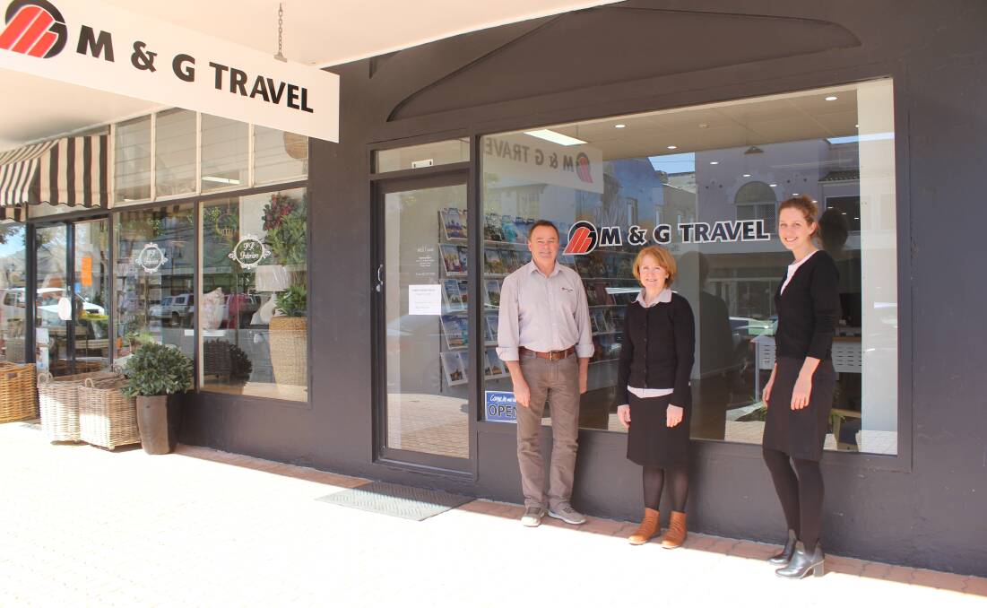 M&G Travel owners Allan and Liz Whiteley and senior travel consultant Catherine Vanbest are remaining positive, despite being significantly impacted by COVID-19. They are pictured out the front of their new building in Frome Street.