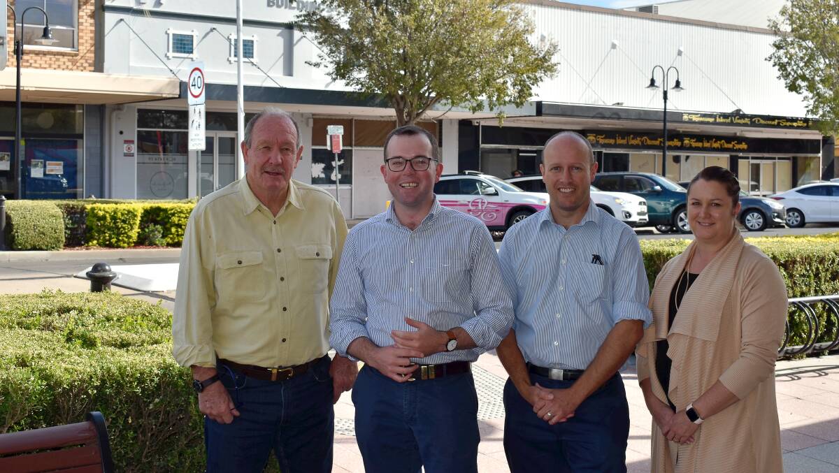 Moree Plains Shire councillor Stephen Ritchie, Northern Tablelands MP Adam Marshall, councils senior urban planner Murray Amos and Moree Real Estate agent Claire van Vegchel in Balo Street with one of the CBDs heritage buildings in the background.