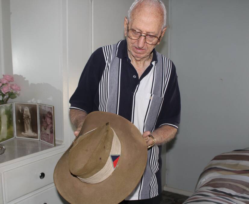 Alf Scott shows off his old slouch hat, which he'll be wearing during Moree's Anzac Day commemorations today.