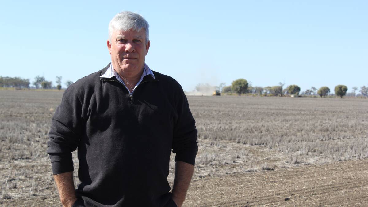 POWERFUL WORDS: Moree poet Murray Hartin's poem Rain From Nowhere is still just as relevant today as it was when it was written 11 years ago. Muz is pictured in front of a dry paddock 5km north of Moree.
