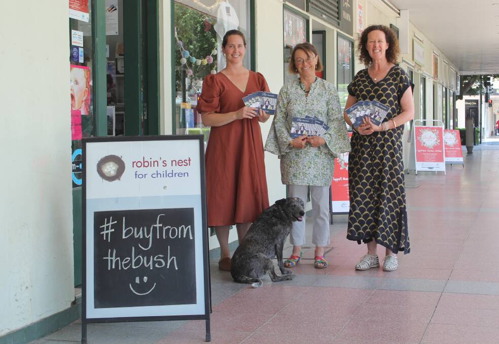 BUY FROM THE BUSH: Meg & Jig's Sally Gall, Wise Words Bookshop's Philippa Morris, Robin's Nest for Children's Dibs Cush and Mitzi the dog encourage locals and visitors to shop locally, with the help of Moree Chamber of Commerce's new Shop #mymoree guide.