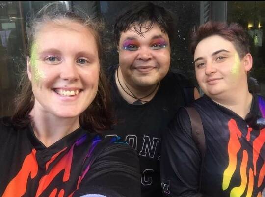 Moree's Lyndon Hankey (centre) experienced Mardi Gras for the first time with his cousin Jeana Evans (right) and her partner Shiann Collins.