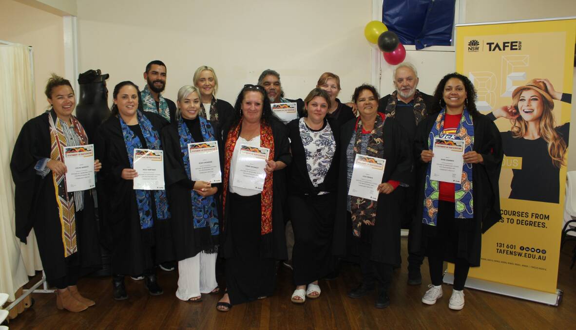 Education Support Officer Amy Smith (fifth from right) and teacher MaryAnn Seymour (fourth from right) with the 10 graduates (l-r) Louise Barwick, Holly Bartram, Patrick Marshall, Renee Werribone, Denni McDonald, Jenny Riddiford, Ricky Werribone, Julie French, Peter Gander and Kiera Edwards who attended the graduation ceremony at Pius X hall on Thursday, June 6.