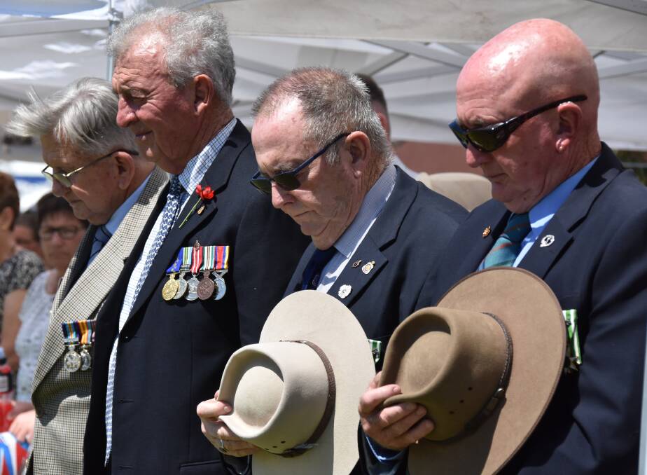 REMEMBERING COMRADES: Moree RSL sub-branch members paused for a minute's silence during last year's Remembrance Day commemoration.