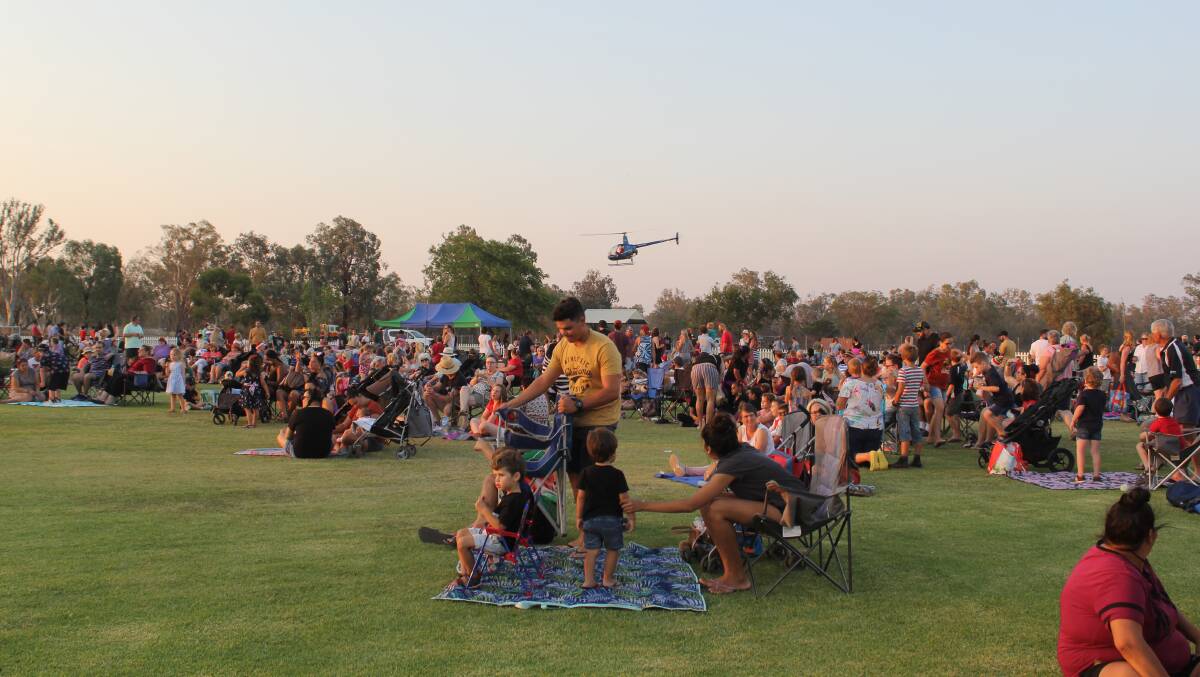 People packed onto Ron Harborne Oval for last year's Christmas at Twilight event.