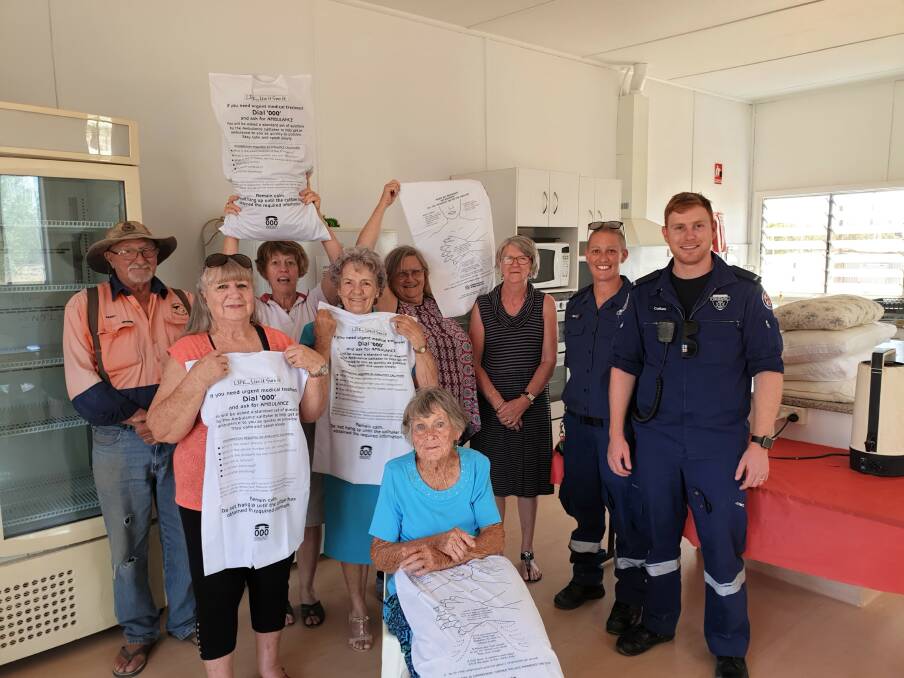 Barry Cowell from the Weemelah Rural Fire Service (left) and members of the Weemelah CWA updated their first aid with Mungindi ambulance officers.