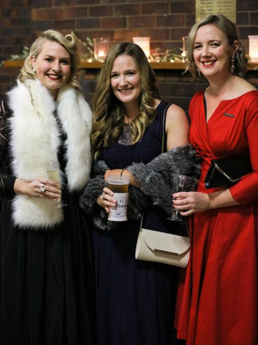 Kendall Tait, Ella Williams and Alice Devlin radiated 1950s glam at last year's Young Aggies Ball. Photo: Melanie Jenson