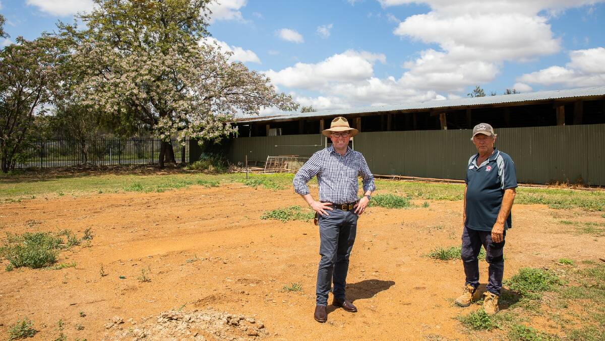 Northern Tablelands MP Adam Marshall and Moree Showground caretaker John Girling on the site where the new $57,480 cattle shed will be constructed. Photo: supplied