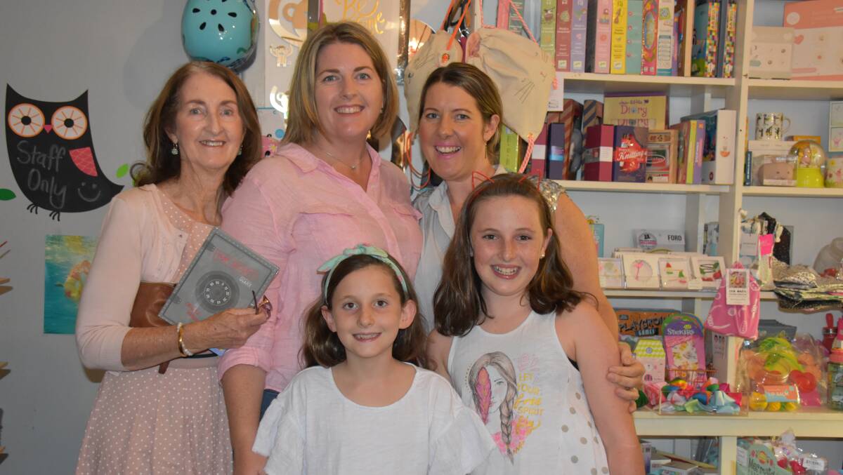 BUSINESS BOOST: Carol Mills, Louise O'Neill, Emma Donaldson, (front) Olivia and Bella Donaldson browsed the large range of items at Robin's Nest for Children during the late night shopping event last year.