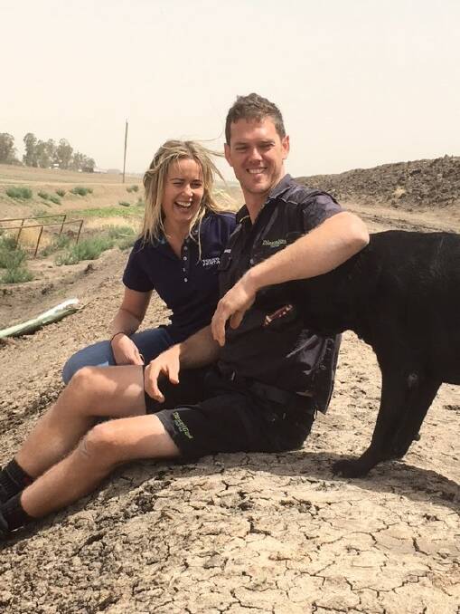 Donna and Aaron Solomon pictured with Opie the labrador who belongs to one of their valued customers from Wee Waa.