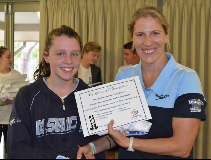 Emily Di Donna was presented a certificate for participating in the Lane Ropes to Leadership Camp by Swimming NSW sport development and participation manager Sarah Koen.