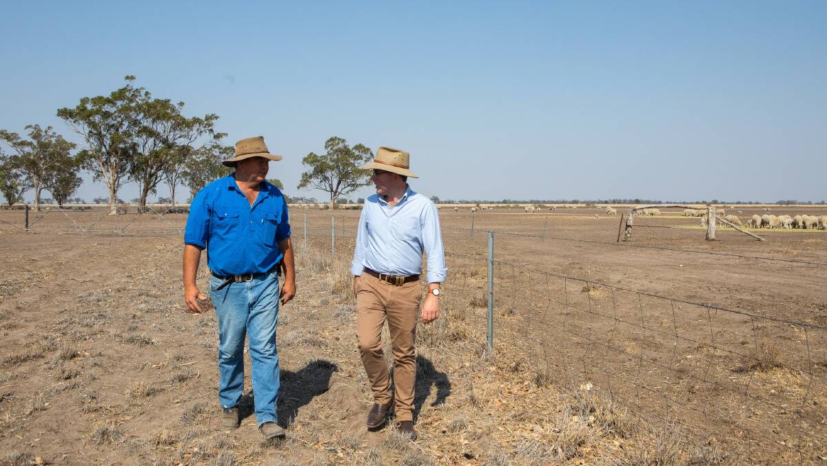Northern Tablelands MP and Agriculture Minister Adam Marshall (right) with Moree farmer Dan Reardon, who is one of close to 144,000 farmers across NSW who will have their Local Land Services rates waived again this year due to ongoing drought and bushfires.