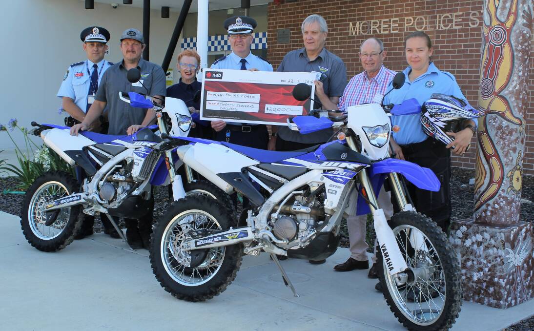 Inspector Stuart Campbell, Chris Thomas (Thomas Lee Motorcycles), Cr Kerry Cassells, Superintendant Paul McDonald, Col Thomas (Thomas Lee Motorcycles), Moree on Gwydir Rotary's Peter Gall and Constable Bec Peachey.