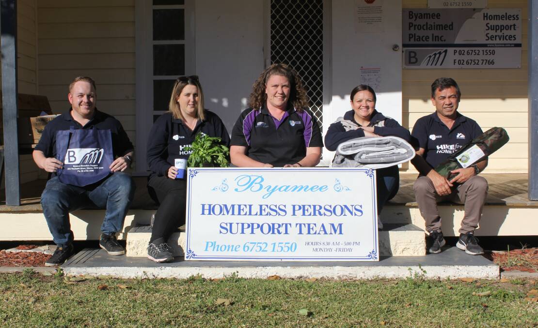 Byamee's Anthony Hancock, Faith Marquett, Jo Williams, Bettyjo Bartholomew and Greg Sampson welcome donations to help support local people who have been placed into housing after being homeless.