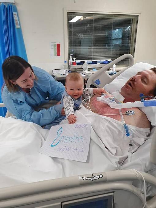 Elle-May and Ollie have not left husband and father Red McClymont's bedside since he was diagnosed with Guillain-Barré Syndrome. Ollie even celebrated his eight-month milestone in hospital with his mum and dad. Photo: contributed