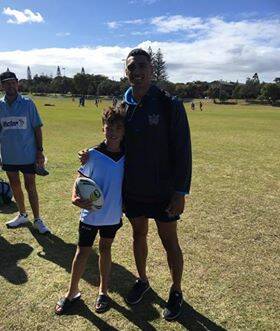 Darcy received the game ball from a Gold Coast Titan's player for being named man of the match in the North West's last game during the state championships.