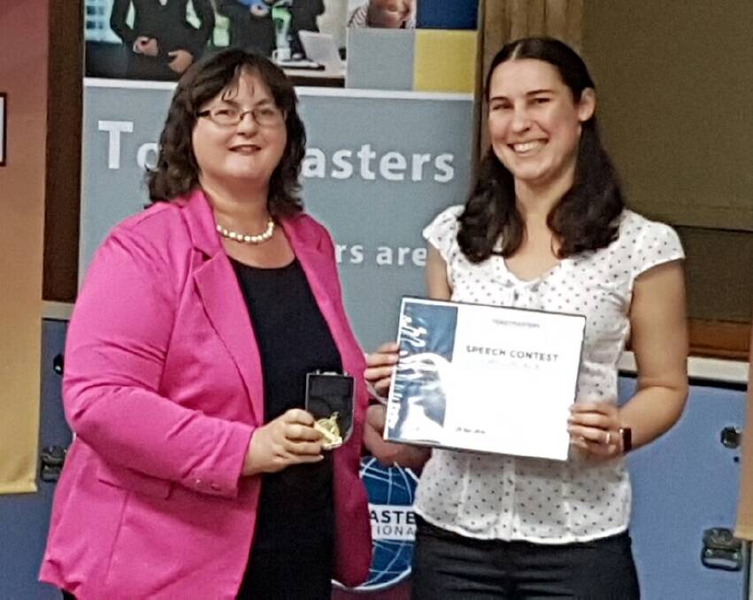 Annette Hadley (right) was presented her winning certificate from competition chair Leanne Kirschner at the northern division contest in Barrabra.
