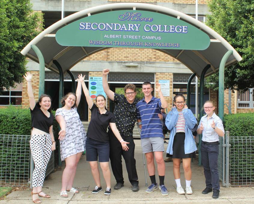 RELIEF: Chantelle Cubis, Kaitlyn Storey, Emily Cosgrove, Davin Jackson, Paddy Montgomery, Vani Noordzy and Jazmine Carroll celebrate their HSC results.