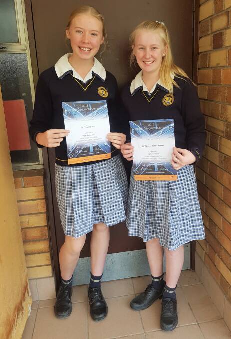 HIGH ACHIEVERS: Year eight students Olivia Mihill and Hannah Bowerman received high distinctions in the Australian Geography Competition.