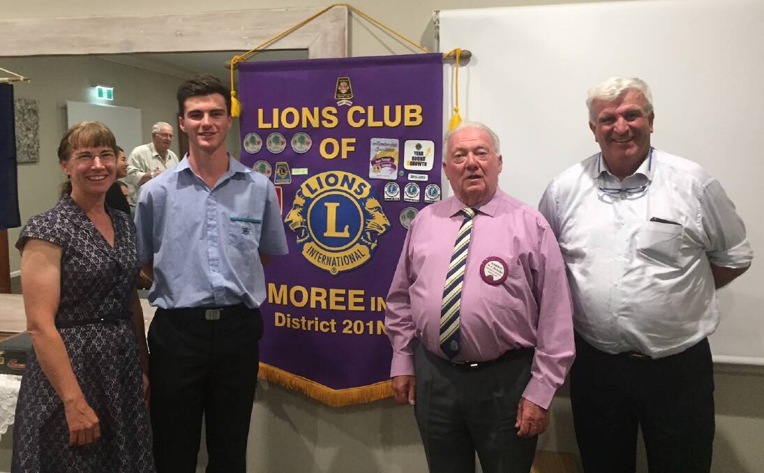 Patrick Montgomery (second from left) with his parents Janelle and Mike Montgomery and Lions Club president Barrie Brooks (second from right).