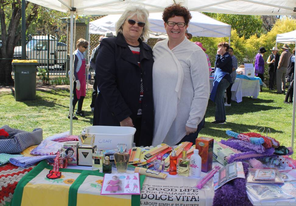 ROLL UP: Rhonda McPherson and Tammy O'Connor at the arts and craft stall at last year's fete.
