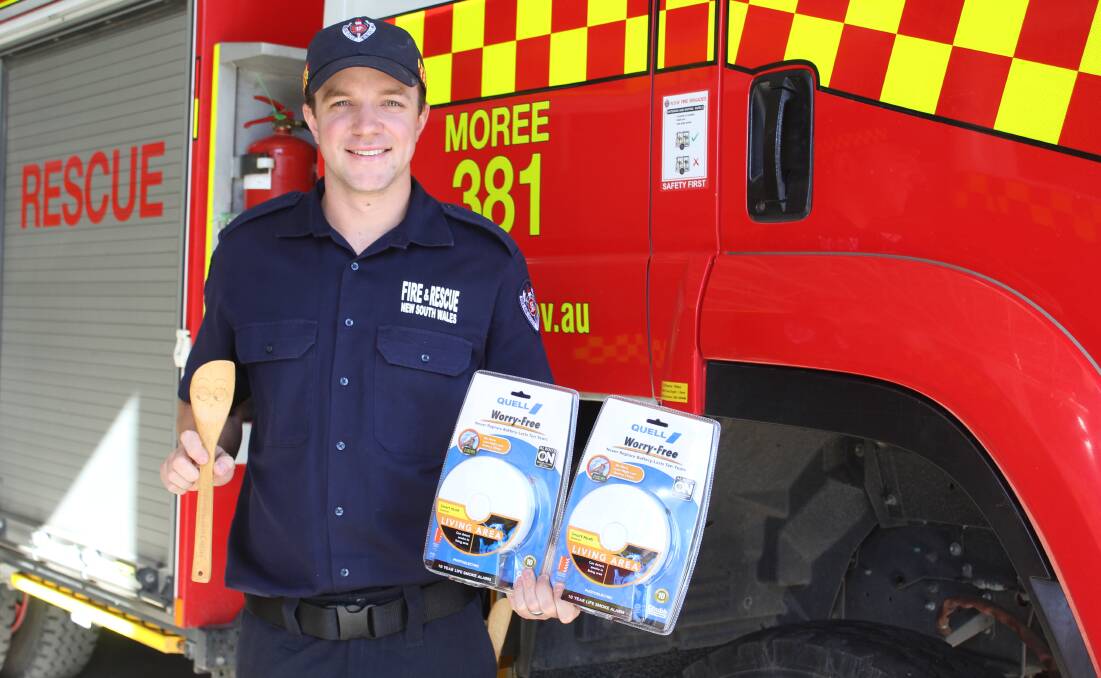 BE VIGILANT: Moree Fire and Rescue fire fighter Adam James encourages residents to ensure they have working smoke alarms this winter and to 'keep looking when cooking'.