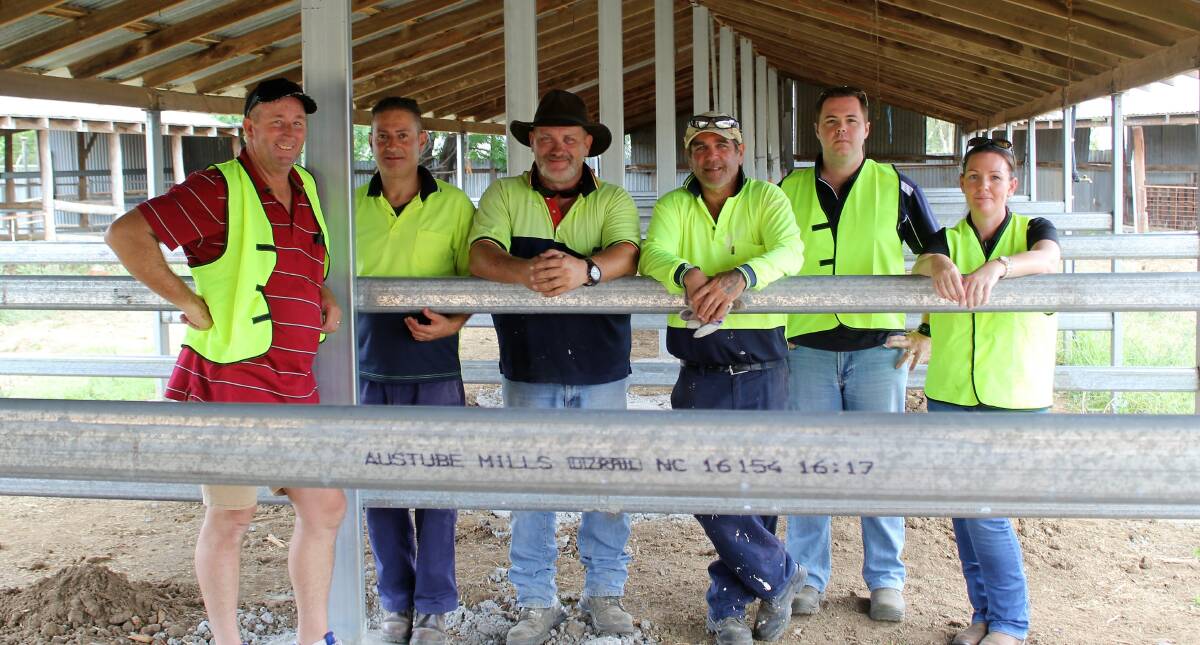 Moree Show Society president Brendan Munn, worker Kon Buliopoulos, Work for the Dole supervisor Luke Hook, worker Brett Draper and Jobs Australia's Adam Gordon and Trish Atkins in the much-improved stables at Moree Showground.