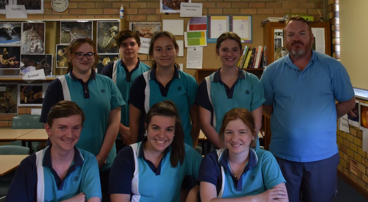 Year 10 and 11 ancient history students (back) Madi Suttie, Joshua Wilson, Natalijia Stanojevic, Evie Smith, teacher Jason Auld, (front) Brennan Cumberland, Grace Carter and Chloe Flegerbein.