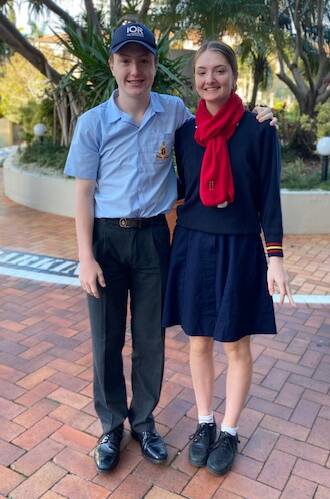 Will and Amelya Brooks go to boarding school on the Gold Coast, and don't know when they'll next be able to return home without having to do hotel quarantine. Photo: Heidi Brooks
